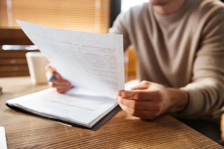 man holding a paper